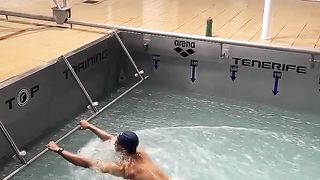 Intensive training for professional swimmers.