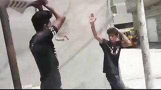 He hits him on the head with a slipper