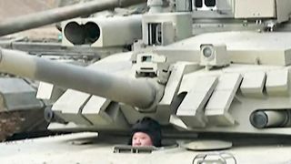 Kim Jong Un Unveils & Drives New Battle Tank _ Watch.