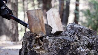 Cut wood with axe