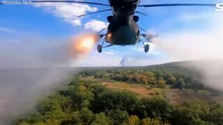 Ukrainian combat helicopters fire missiles at Russian ground targets