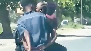 Kissing on a bike....