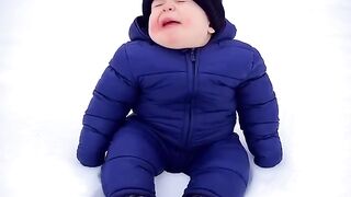small boy in blue dress