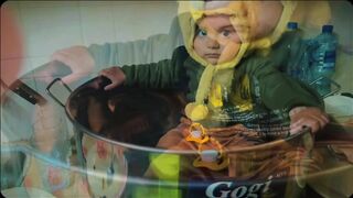 Kid is enjoying in the bowl
