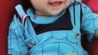 Cute baby feeling enjoy