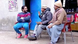 Rana Azad taking his household goods from the shopkeeper