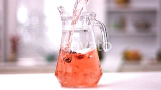 Jug of juice being poured