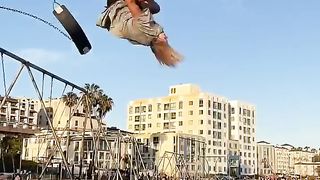 Reverse triple backflip off swing set!????