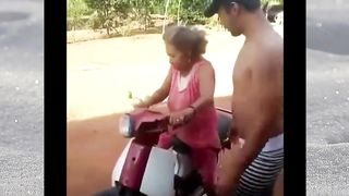 Mothers who are riding a motorbike and watch its continuation