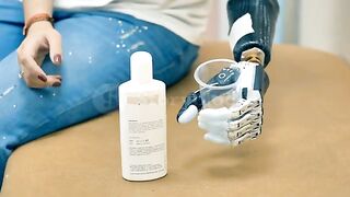 videoblocks-young-girl-with-amputated-hand-using-robotic-prosthesis-4k