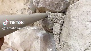 Reproducción de piedra de mamposteria,realizada con mortero. . . .