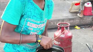 Teen Ager Hardworking Boy making Potato Twister