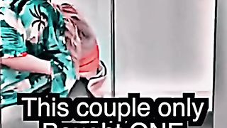A girl digs into a guy's pants