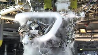 NASA's next moon mission commander raised his hands in celebration during a powerful rocket engine test.