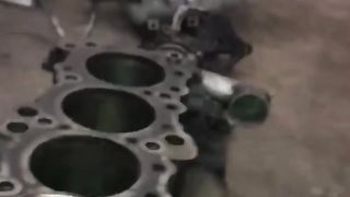 Installing a Piston into an Engine with a Hammer