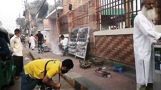 Spraying Mosquito spray inside drain