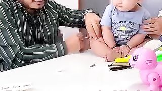 Lovely doctor with cute baby