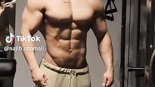 Dady oily posing in gym