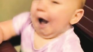 Baby trying lemon 1st time.