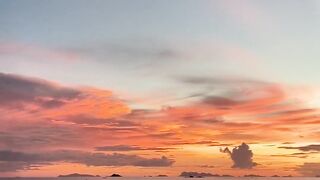"Sun's Farewell: A Stunning Sunset Display"