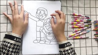 hướng dẫn tô màu bức tranh Nobita và Doraemon.
