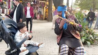 An innocent child queitly listening flut and enjoy moment.????