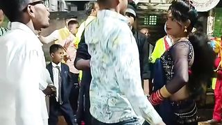 The boy was dancing with the girl when someone hit him from behind