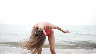 Girl dancing on beach