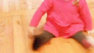 Baby boy enjoying at home using mobile phone