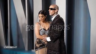 HILLS, CA - MARCH 27: (L-R) Kourtney Kardashian and Travis Barker attend the 2022 Vanity Fair Oscar party