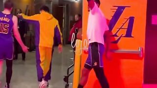 Lakers players greeting young Lakers fans after defeating the 76ers