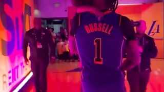 D'Angelo Russell celebrating after breaking Lakers franchise record with his son & young Lakers fans