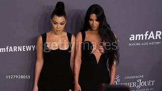 Kourtney Kardashian and Kim Kardashian at 21st Annual