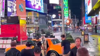 Madonna has gone back in time ... for a video shoot in the middle of Times Square.