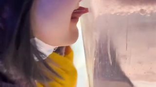 Amazing Girl Tongue Stuck on Ice Wall