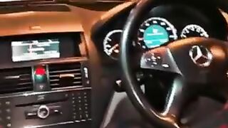 a boy driving car with girl