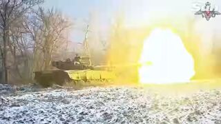 Russian T-80 armoured tanks fire at Ukrainian targets on winter battlefield