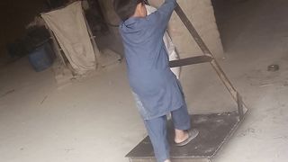 The child is playing with a stand