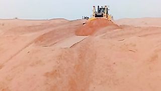 Bulldozer mud pushing