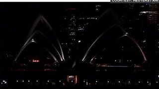 Landmarks around the world turn dark for Earth Hour 2024