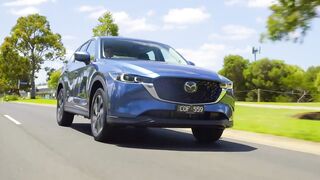 Mazda CX-5 Touring Petrol AWD in Eternal Blue Driving in the country