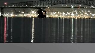 Horrifying moment cargo ship hits Baltimore bridge, causing it to collapse and send cars plummeting into water.