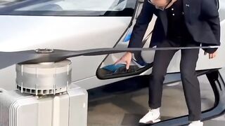 futuristic electric drone car that can fly with a capacity of 2 people made of carbon fiber