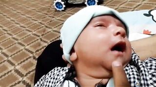 my new born baby smileling