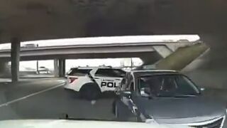 Wild video shows desperate domestic violence suspect clinging to moving car as he's chased by police before he's shot by officers