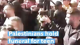 Palestinians_Hold_Funeral_for_Teen_Killed_During_Clashes_With_Israeli_Forces_#shorts(360p).