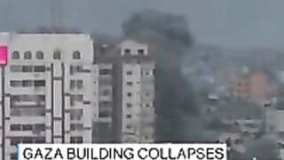 Gaza_building_collapses_after_airstrike___ABC_News(240p).