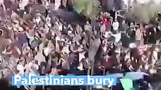 Palestinians_Bury_21_People_Killed_in_Gaza_Fire_#shorts___VOA_News(240p).