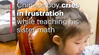 "Heartfelt Determination: Chinese Boy Cries in Frustration While Teaching His Sister Math"