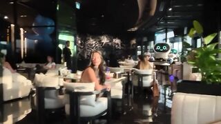 Futuristic restaurant with robot waiters